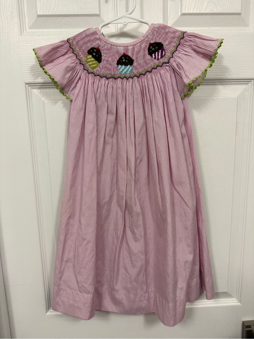 Girls Pink Smocked Cupcake dress with flutter sleeves